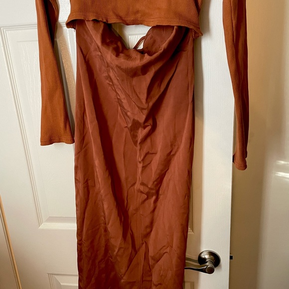 Long length orange/burgundy turtleneck dress with a peekaboo slit in the middle. - Picture 3 of 4